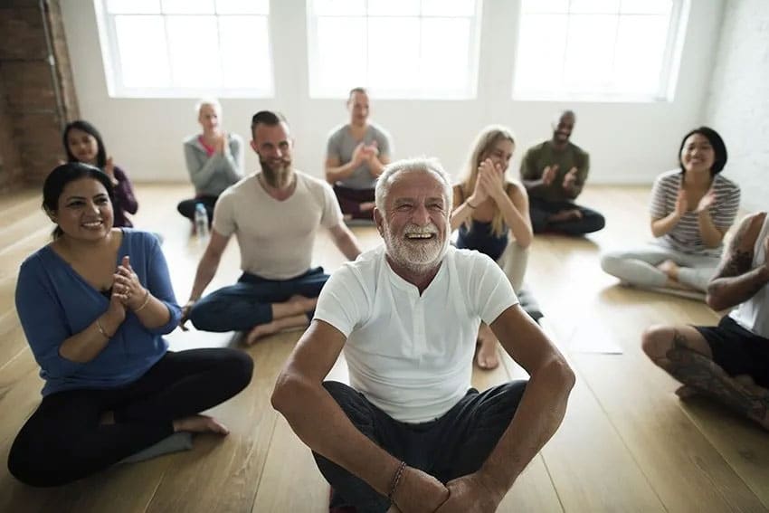 Group of mature people enjoying yoga